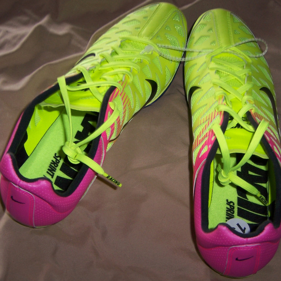 nike track spikes pink and yellow
